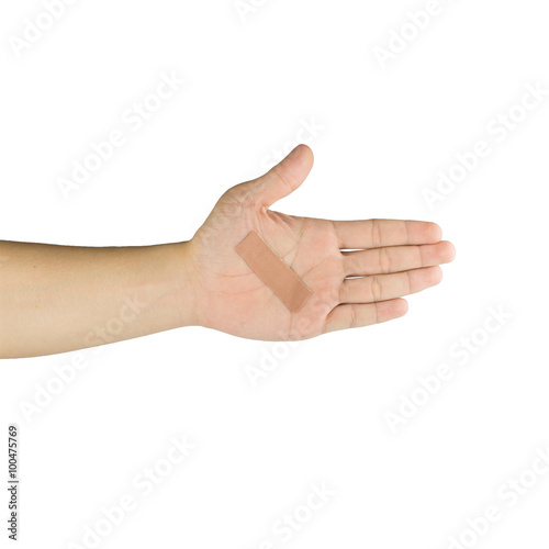 Palm and fingers with adhesive bandage, isolated on white backgr
