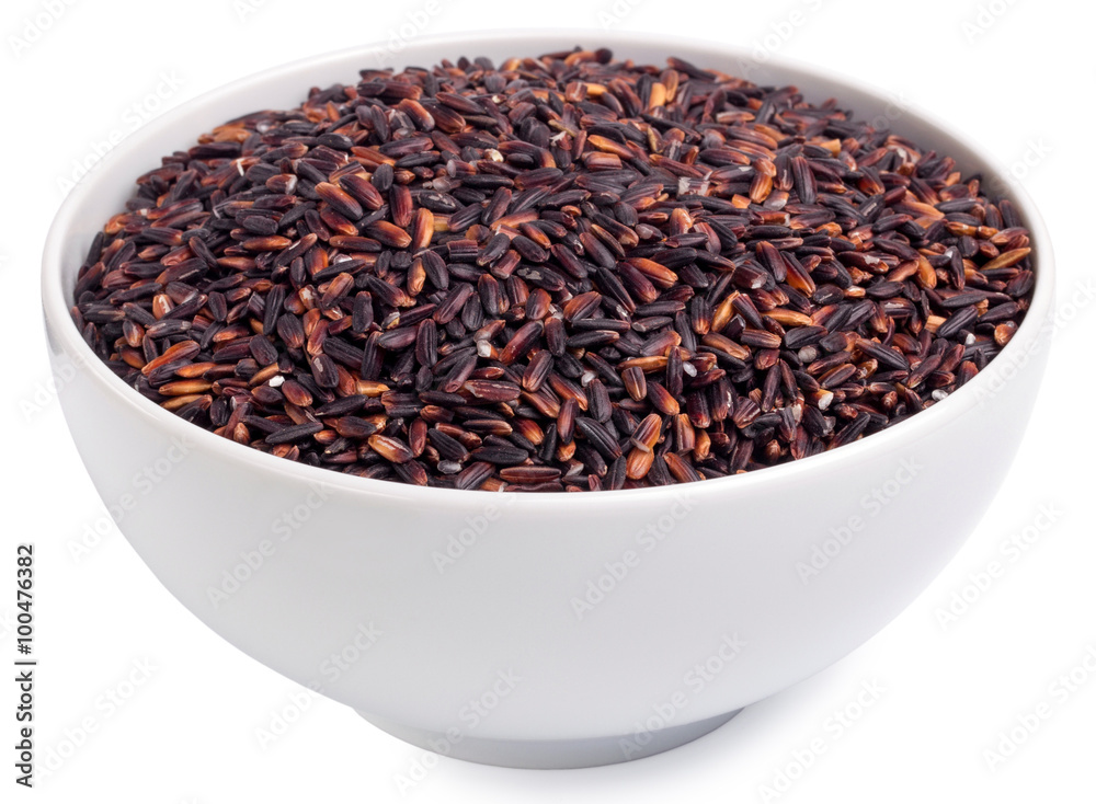 Black rice in a glass bowl isolated Black rice in a glass bowl isolated