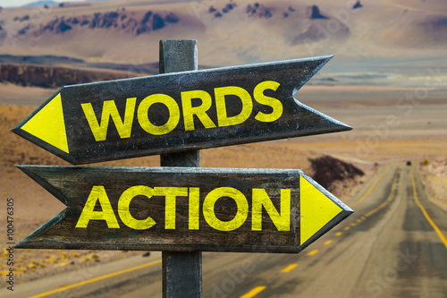 Words - Action signpost in a desert background