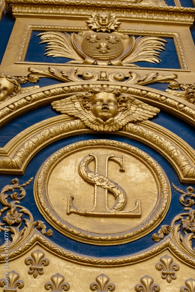 Heraldic motifs on front door to Les Invalides. Paris, France