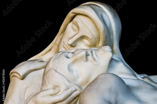 More than 100 years old religious statue Madonna and Christ (compassion)