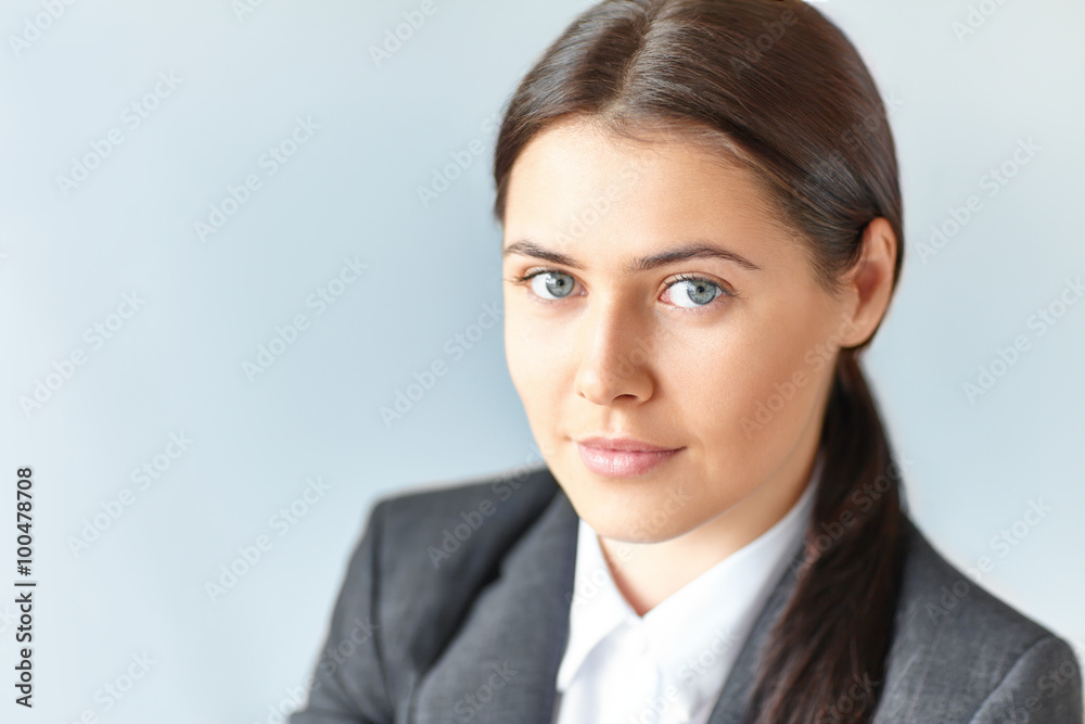 Portrait of young beautiful business woman in the office Portrait of young beautiful business woman in the office
