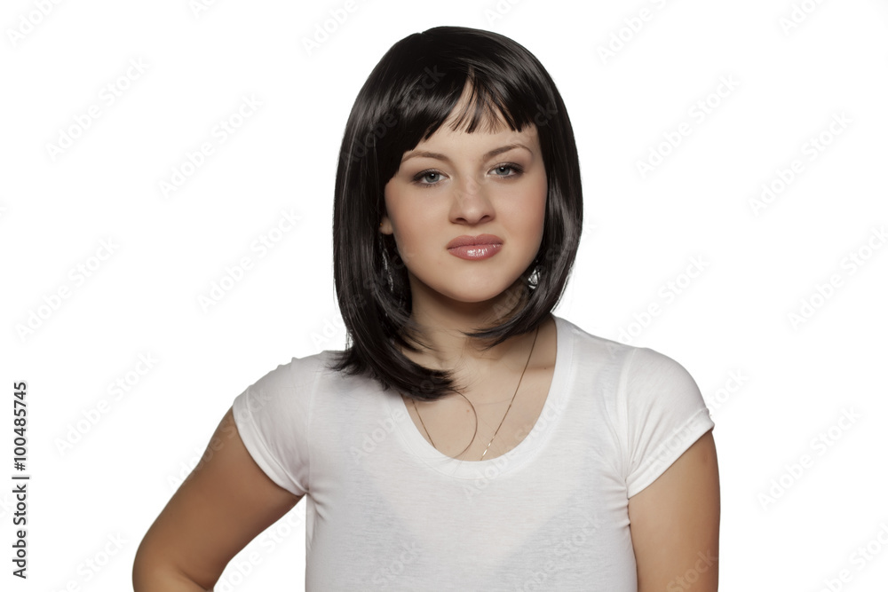 beautiful young woman posing with a short black wig
