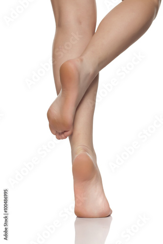 bare female feet on a white floor