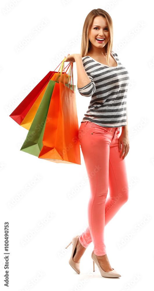 Young pretty woman with shopping packages isolated on white