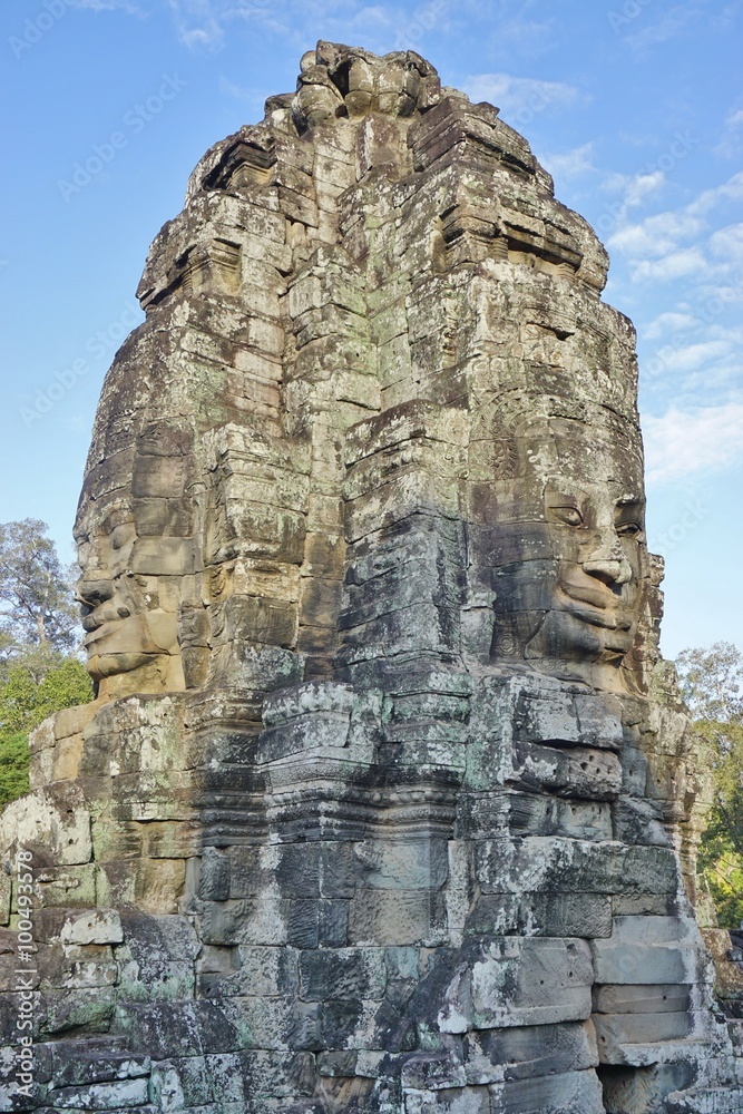 Ruins of the Bayon temple with its giant stone heads near Angkor, Cambodia 

