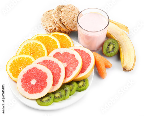 Fruits and crispbread  isolated on white. Healthy eating concept.