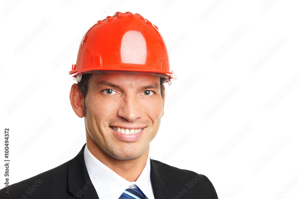 Handsome businessman in a protective helmet, right you can write some text Handsome businessman in a protective helmet, right you can write some text