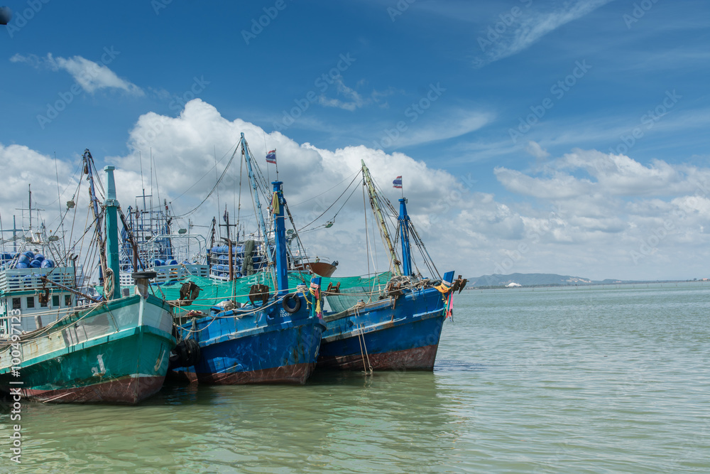 Thai wooden fishing boats in harbor, Thailand Thai wooden fishing boats in harbor, Thailand