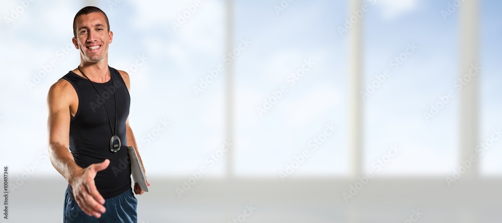 Composite image of personal trainer giving handshake Composite image of personal trainer giving handshake
