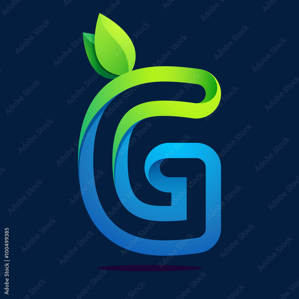 Obraz premium G letter with green leaves and water waves.