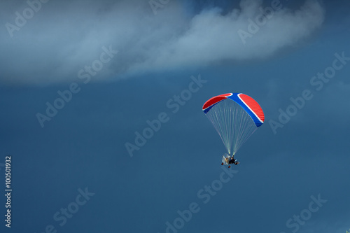 paraplane in the blue sky photo