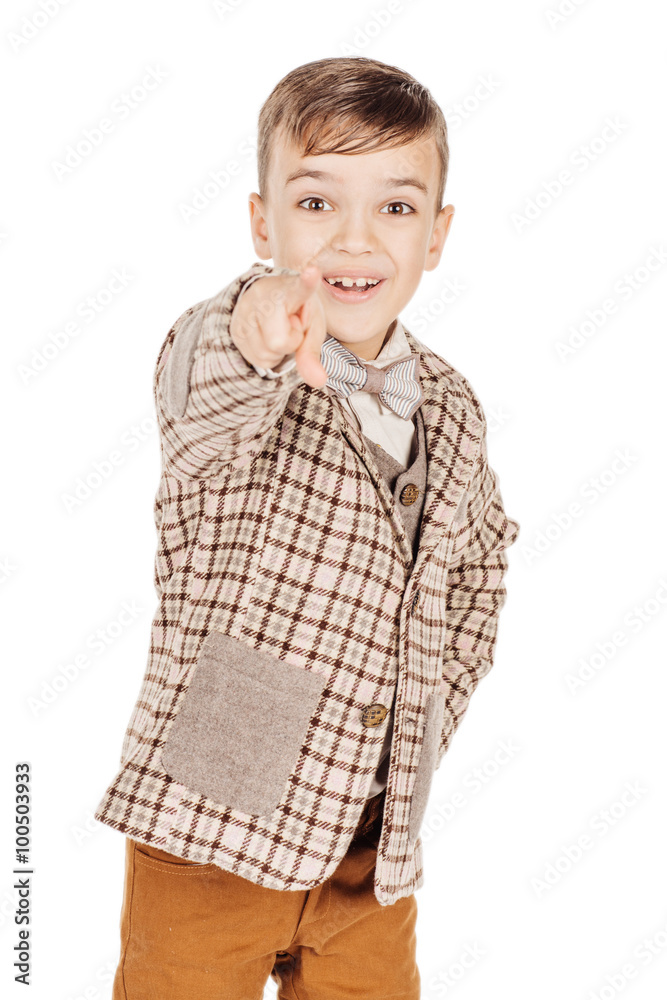 Portrait adorable young happy boy looking at camera isolated on Portrait adorable young happy boy looking at camera isolated on