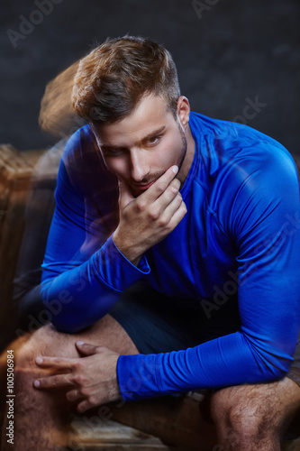 Thinking man in blue jacket. © Fxquadro