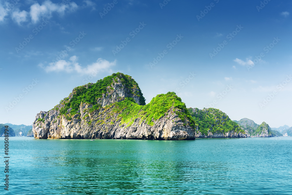 Scenic view of rocks-isles and azure water in the Ha Long Bay