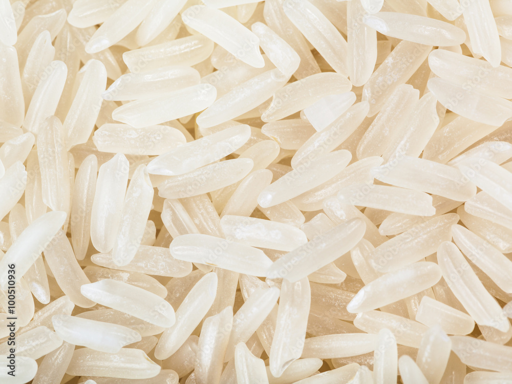 long-grain uncooked white jasmine rice close up long-grain uncooked white jasmine rice close up