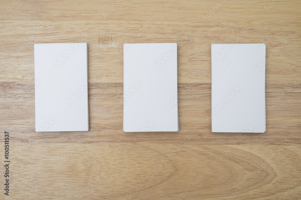 blank business cards stack up on wooden table blank business cards stack up on wooden table