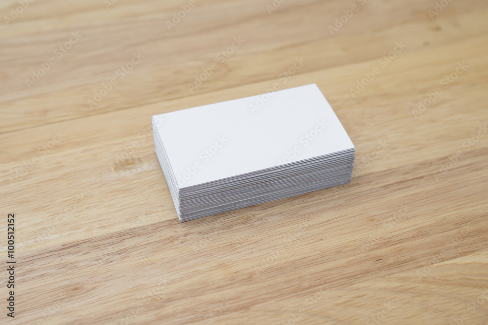 blank business cards stack up on wooden table blank business cards stack up on wooden table