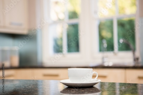 White cup on kitchen counter