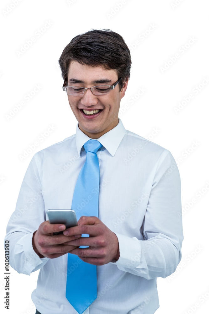 Smiling asian businessman using his telephone