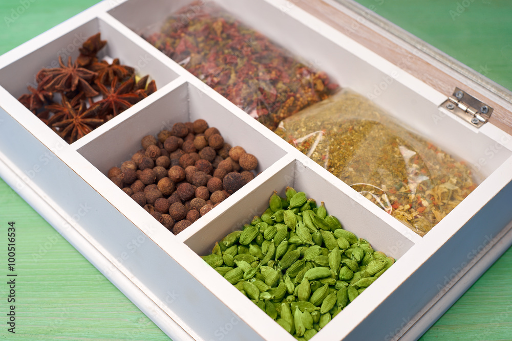 set of spices in a wooden box set of spices in a wooden box