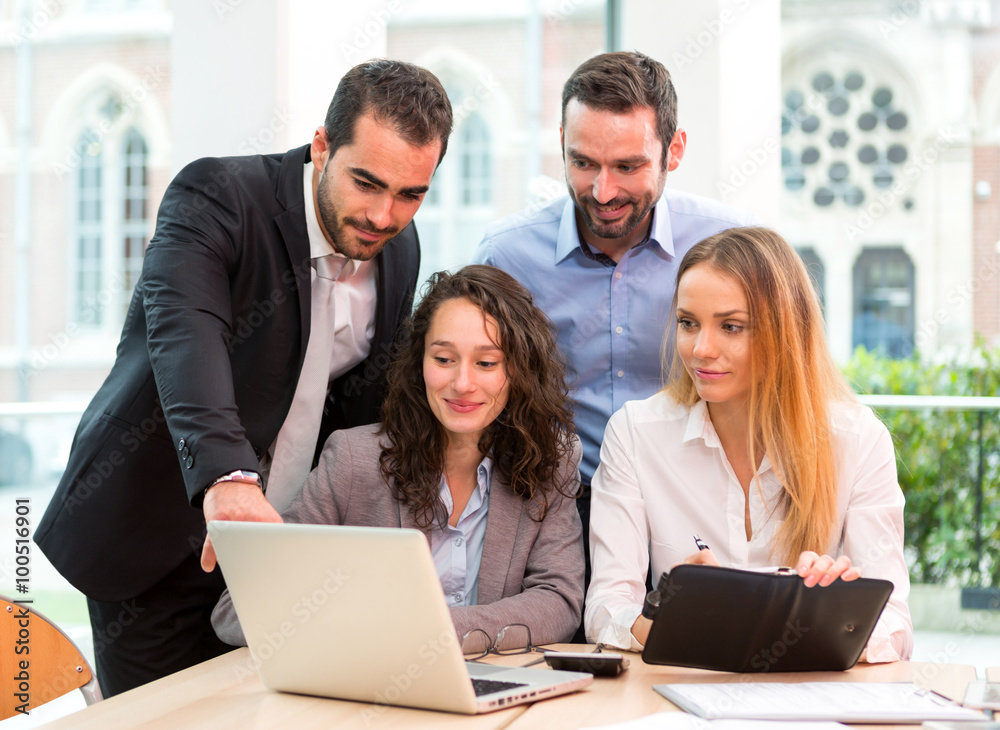 Group of business people working together at the office Group of business people working together at the office