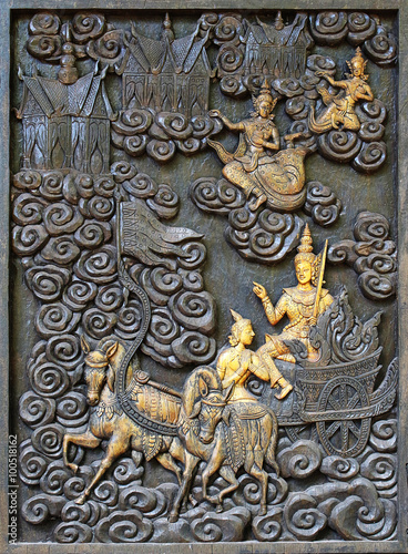 Ancient carving wooden door of Thai temple, Thailand. © naiauss