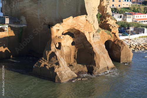 rock of tuff in naples coast, italy photo