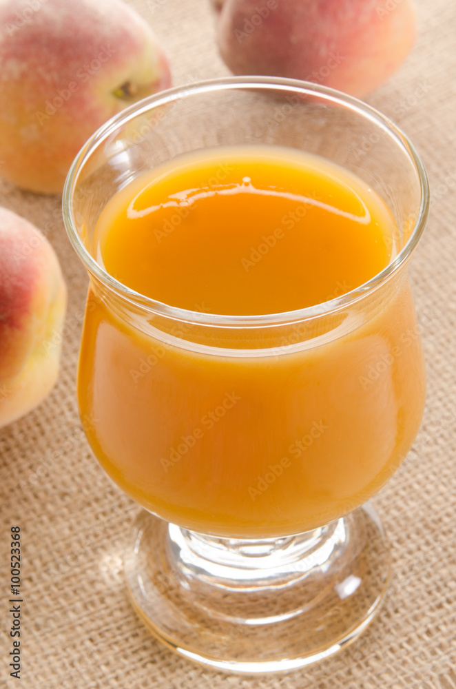 peach juice in a glass peach juice in a glass