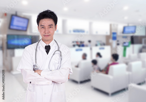 doctor smiling with arms crossed