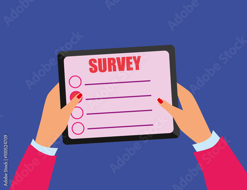 Female hands with nail varnish holding a tablet device on which there is a survey screen with participation buttons and space for additional text