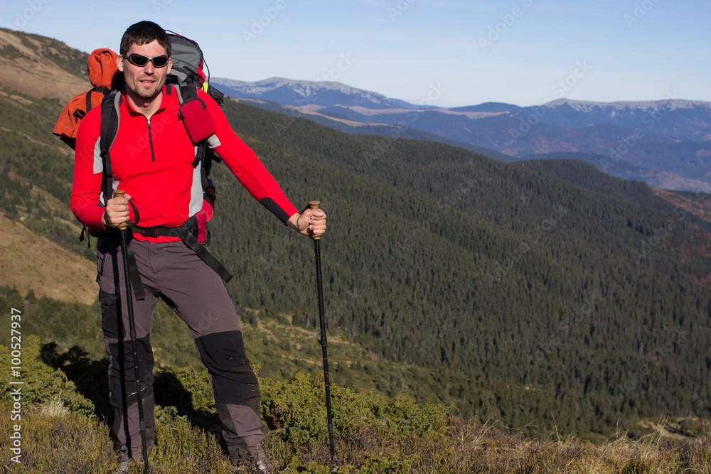 
    Hiker trekking in the mountains.