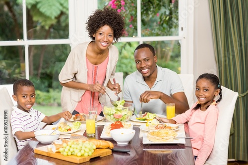 Happy family enjoying their meal