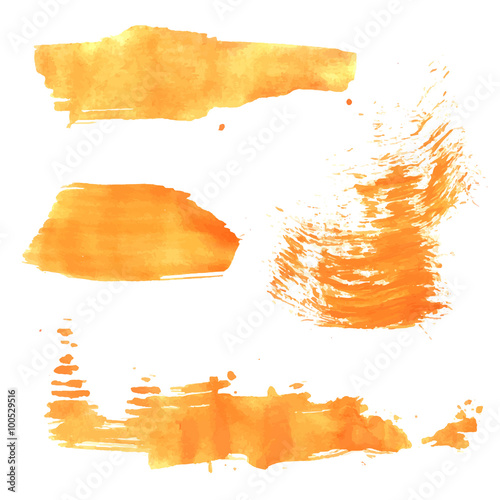 Abstract realistic wet smears orange paint on white paper