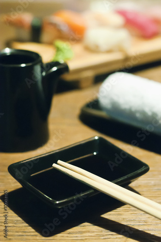 Sushi and black set of tableware