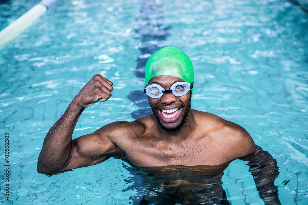 Fit man raising his arm