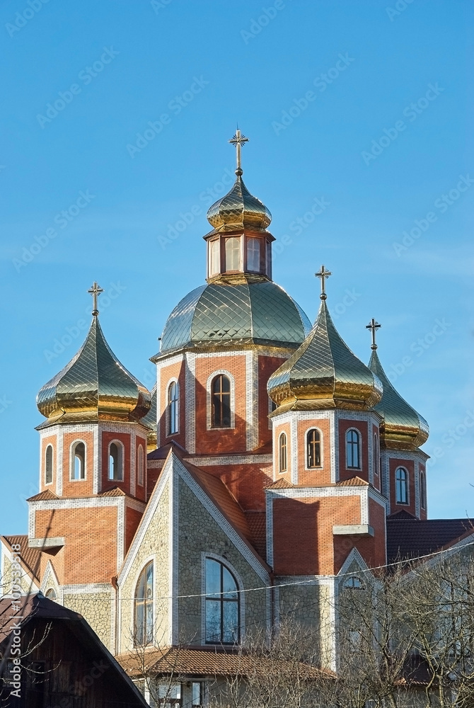 Christian church with golden domes and crosses
