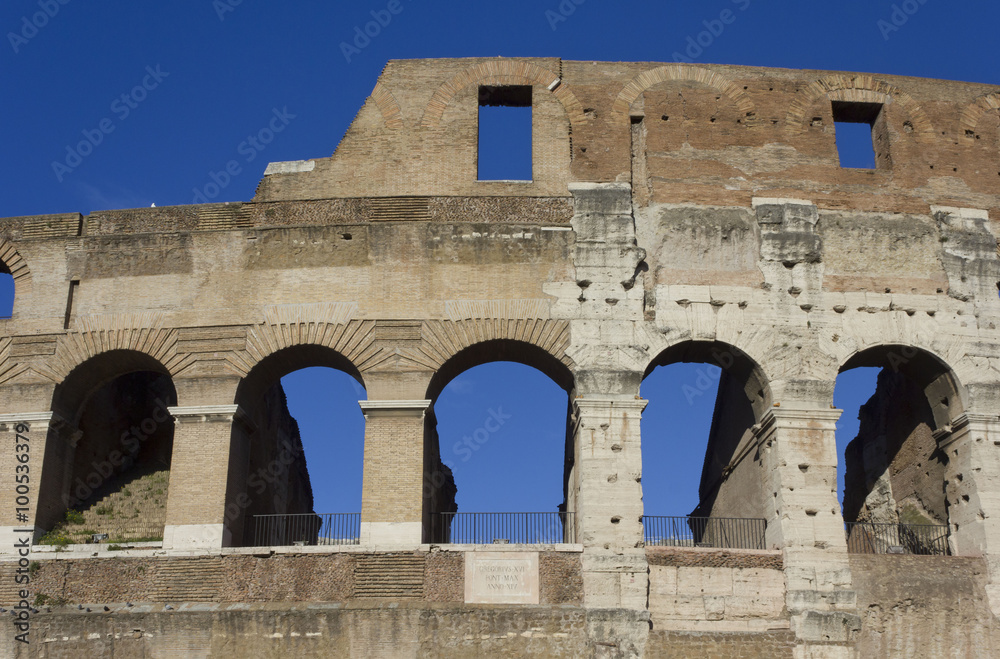 Close up detail of the external walls of Colosseum ruins in Rome, Italy Close up detail of the external walls of Colosseum ruins in Rome, Italy
