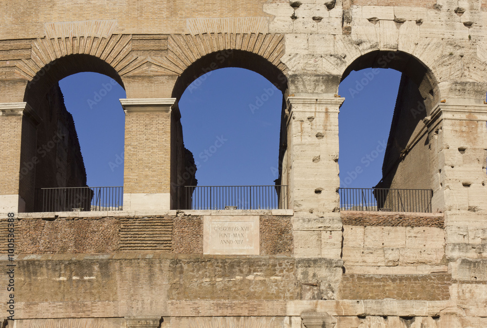 Close up detail of the external walls of Colosseum ruins in Rome, Italy
