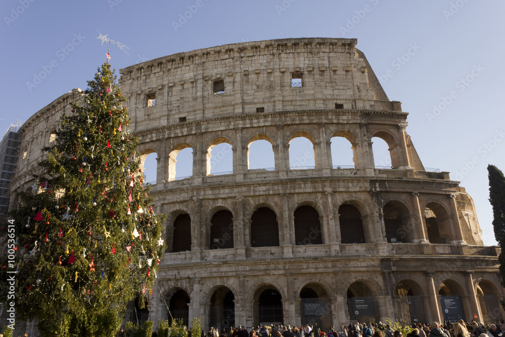 The Colosseum in Rome with a Christmas Tree on its side 