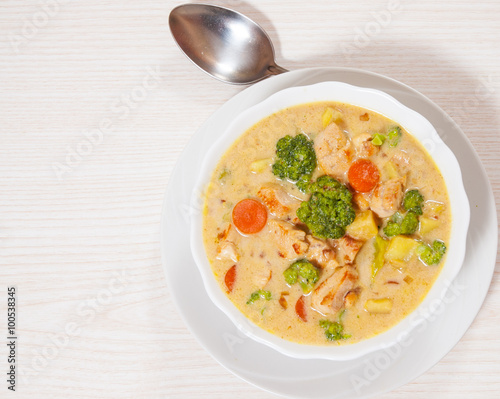 chicken soup with vegetables and cheese