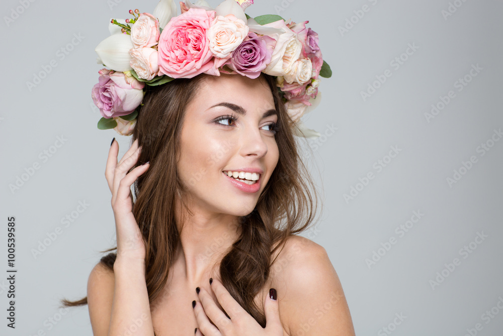 Pretty woman with wreath from flowers on head Pretty woman with wreath from flowers on head