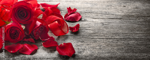 Roses on wooden board
