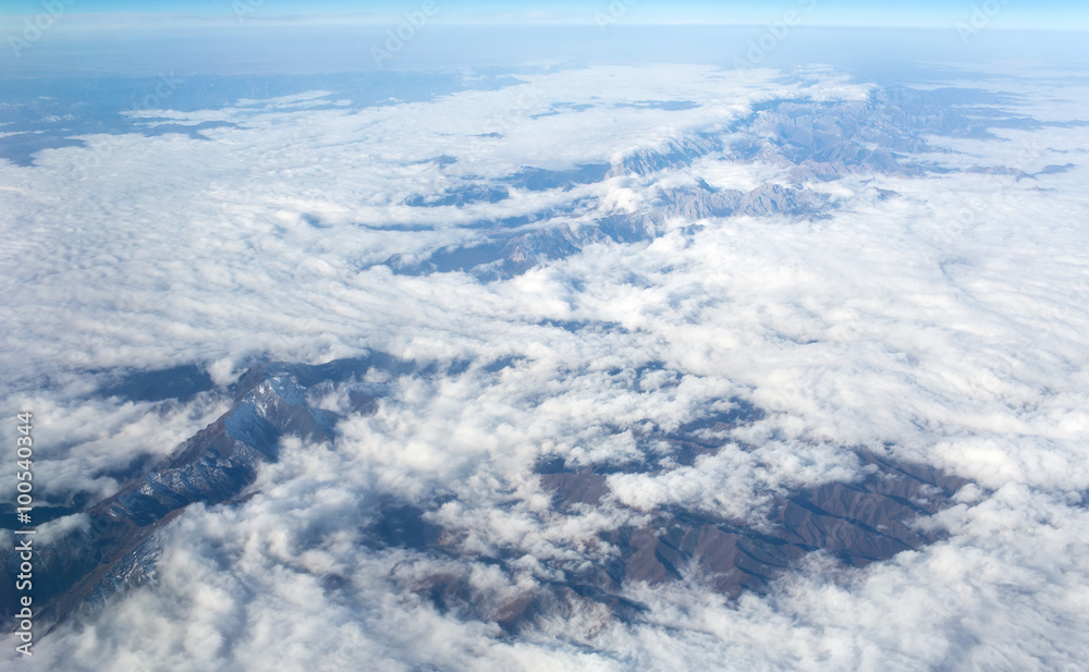 Above the clouds.Wing aircraft in the sky under earth Above the clouds.Wing aircraft in the sky under earth