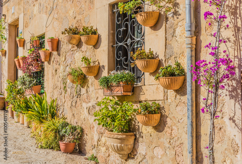 Beautiful decorated rustic house wall in a old village