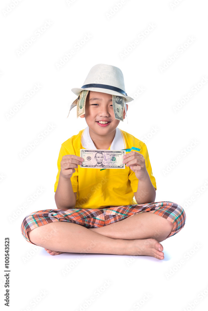 Asian child holding money while standing isolated on white backg Asian child holding money while standing isolated on white backg