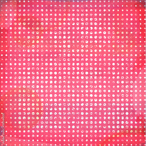 Grunge pink dotted background.
