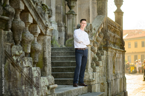 beautiful stylish groom near the Church