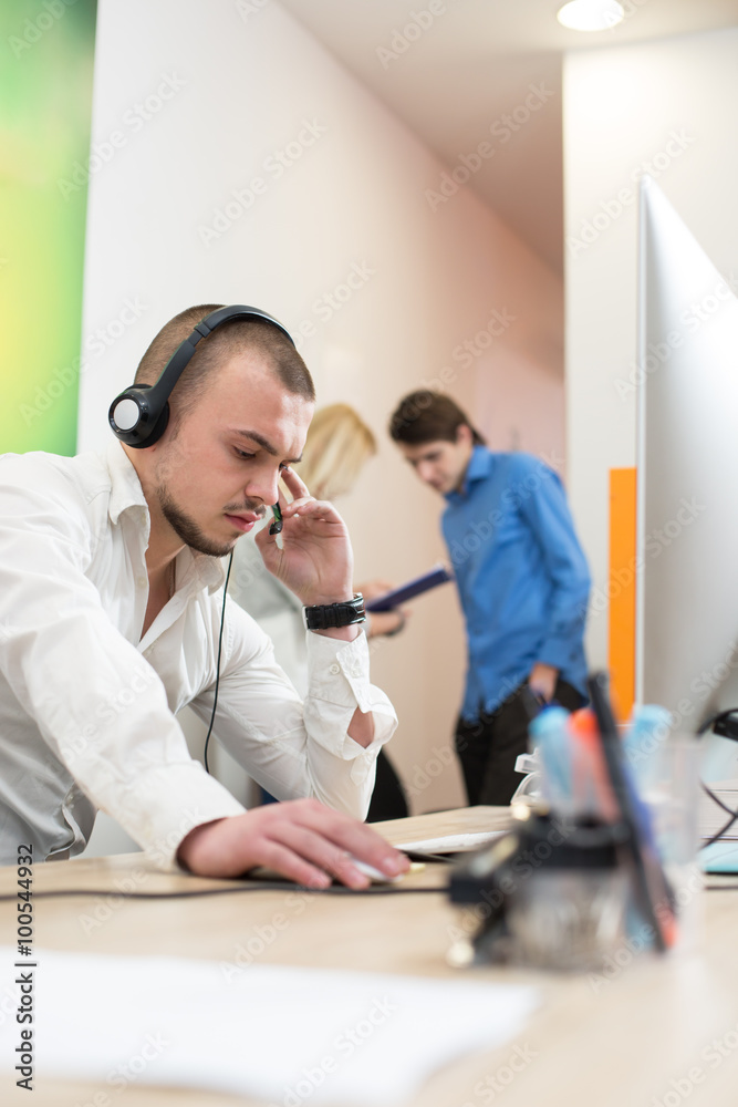 Fototapeta premium Stressed businessman unable to cope the telephone