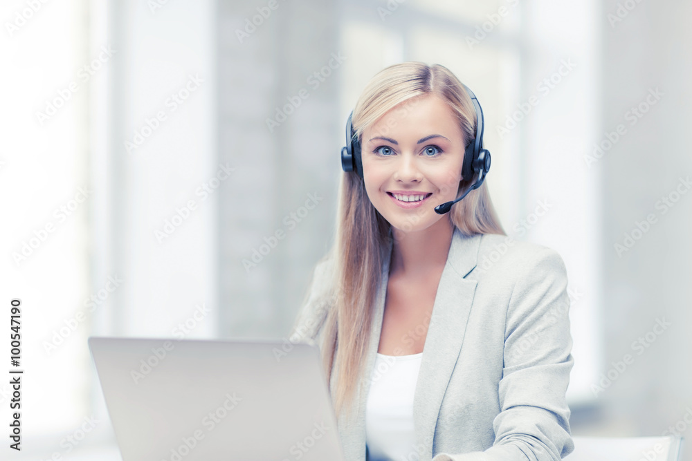 friendly female helpline operator with laptop friendly female helpline operator with laptop